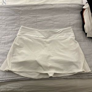 White Lululemon “play off the pleats” tennis skirt
